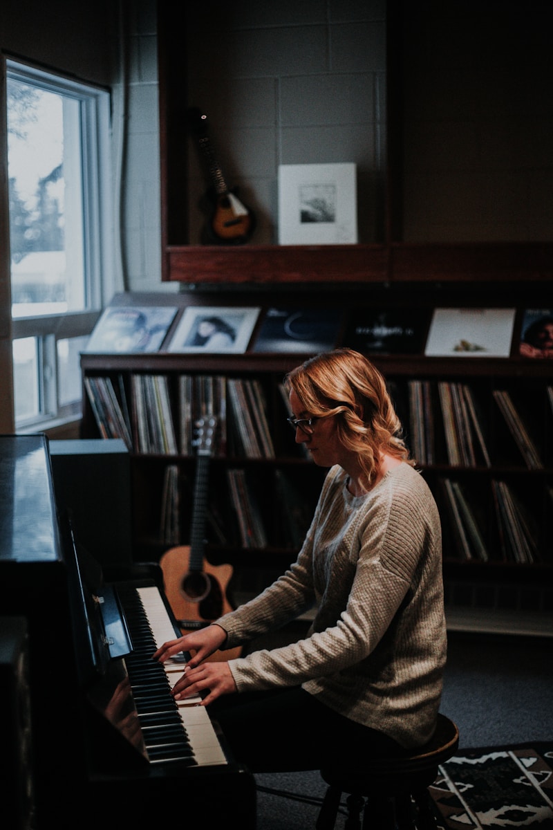 A pianist playing an upright piano